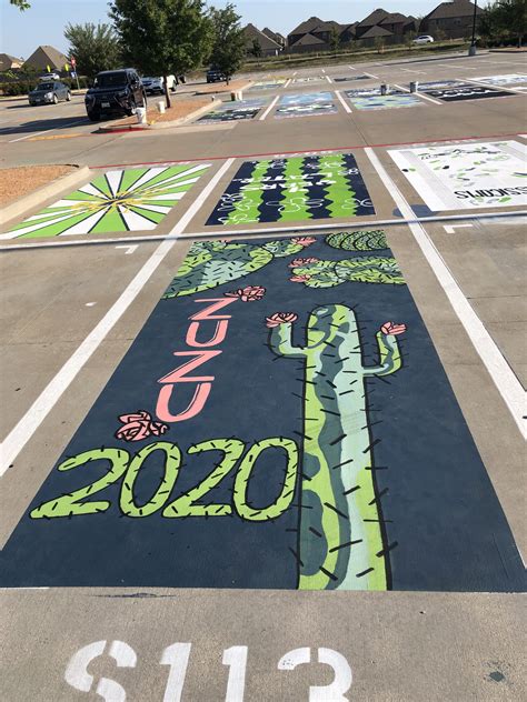 the parking lot has been painted with different colors and numbers for