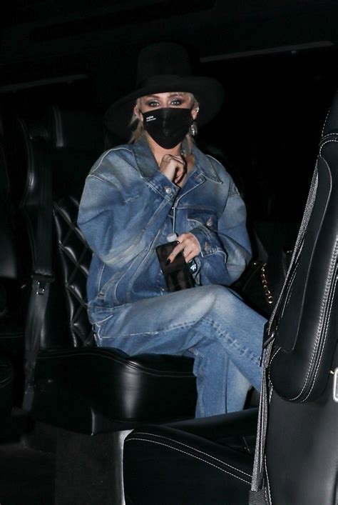 Miley Cyrus Looks Unrecognizable In Double Denim And Black Trilby As