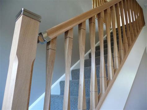 The upper and lower ends of the wood spindles are attached to the corresponding banister or stair tread with glue, screws, dowels or nails. Contemporary Raymond Twist Stair Spindles 41mm