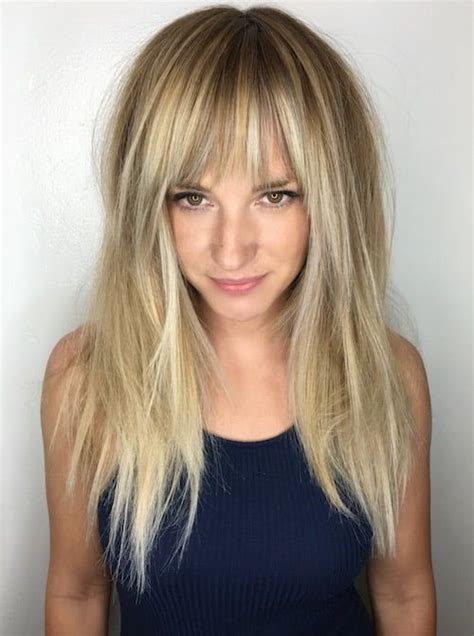 Layer your long blonde hair for a dynamic and fun look. long hair balayage bangs | Long thin hair, Hairstyles for ...