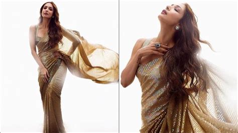 malaika arora sets the internet on fire in a dazzling bling saree by manish malhotra fashion