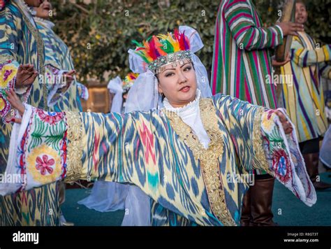 Woman Dancing Beauty In Traditional Costume Dress Suit In Rukhobod Mausoleum Samarkand