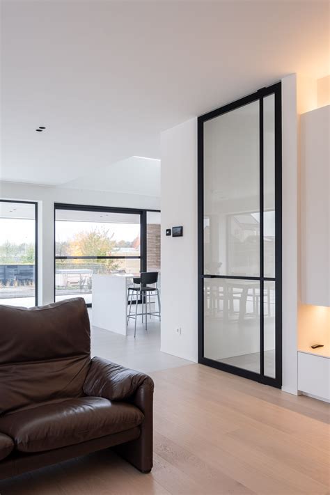 Crittall Style Glass Pivot Door Made With Black Anodized Aluminium