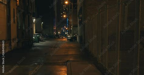 Establishing Shot Of A Dark Alleyway At Night Atmospheric 4k Footage
