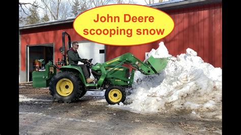 John Deere 3038e Compact Tractor Video Scooping Snow With Bucket