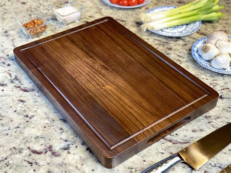 Walnut Wood Cutting Board 17x11x126 Inches Reversible With Handles And