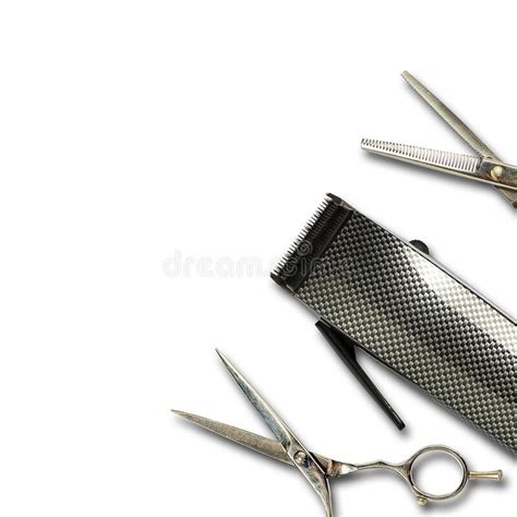 Hair Clipper And Hairdresser Scissors Isolated On A White Background