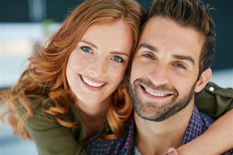 Were Happy Together Portrait Of An Affectionate Young Couple Embracing