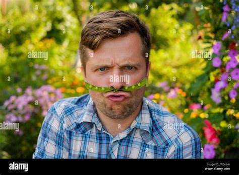 Young Funny Man Makes A Funny Face Stock Photo Alamy