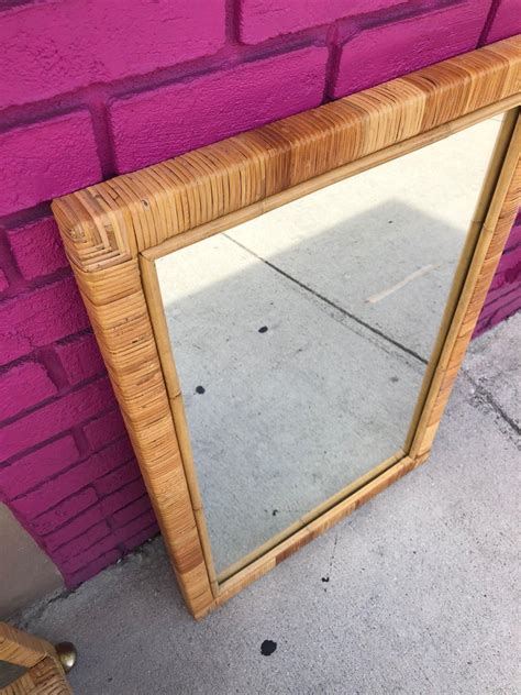 Diameter of mirror 6 1/2 in., diameter with frame approx. Vintage Rectangular Bamboo and Rattan Wall Mirror at 1stdibs