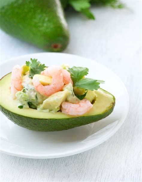 In a large serving bowl, place the shrimp, celery, bell pepper, peas, green onion, and dill. Appetizer Recipe: Avocado Bowls with Shrimp - 12 Tomatoes