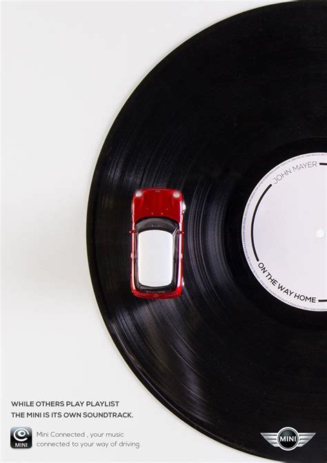 An Overhead View Of A Black Record With Red Cars On The Front And Back