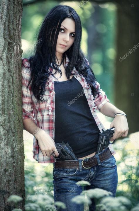 Young Woman With Guns Stock Photo By ©chaoss 1369106