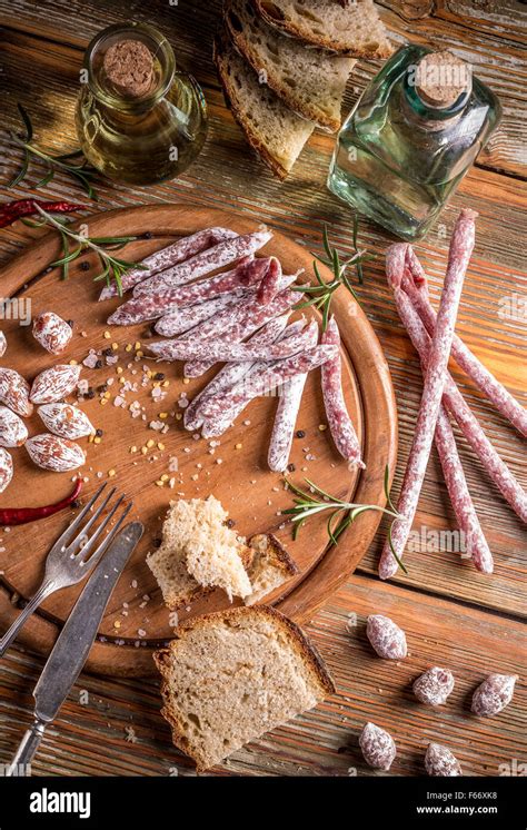 Cold Meat Plate With Salami Sticks And Small Salami Stock Photo Alamy