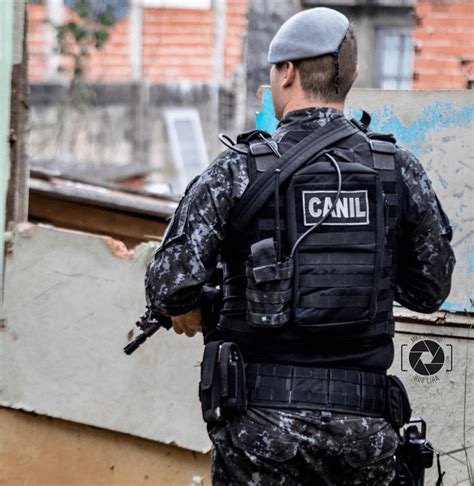 Brazilian Police Officer From K 9 Battalion Patrolling The Favela 5th Shock Policing