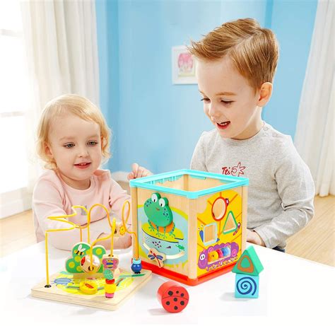 The following are the things you need to consider before purchasing a toy for your baby toys are expensive, and if possible, get those that your baby can use for years down the line. TOP BRIGHT Wooden Activity Cube Toys for 1 Year Old Girl ...