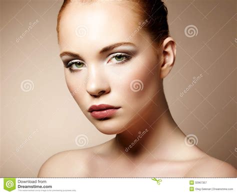 Beautiful Young Woman With Bright Make Up And Manicure Stock Image