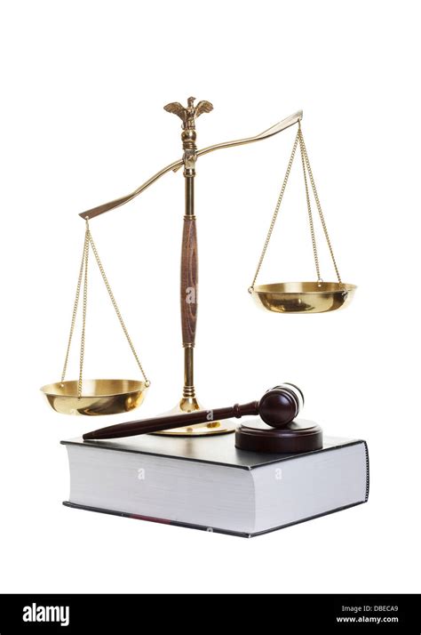 Golden Scales Of Justice Gavel And Law Book On A White Background
