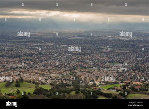 Aerial View Of The Silicon Valley Green Countryside And Ominous Sky