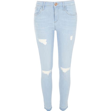 River Island Light Wash Ripped Amelie Super Skinny Jeans In Blue Lyst