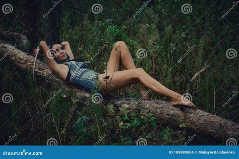 A Girl Tied To A Tree In A Forest Fantasy Stock Photo Image Of