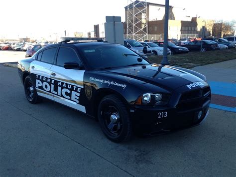 A Police Car Is Parked On The Side Of The Road