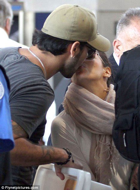 Eva Longoria And Eduardo Share Lingering Kisses At Check In Desk Before Jetting To Miami