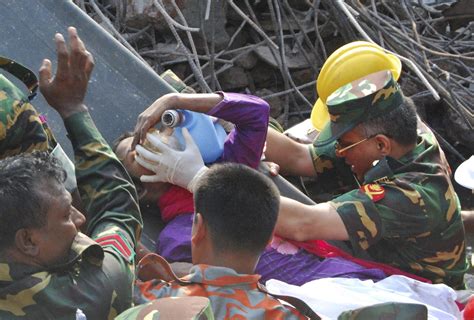 The Incredible Image Of A Woman Being Rescued From The Bangladesh Rubble After Days Is