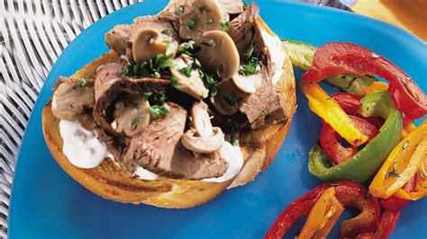 Flank Steak And Mushrooms On Sourdough Bread With Blue Cheese Sauce