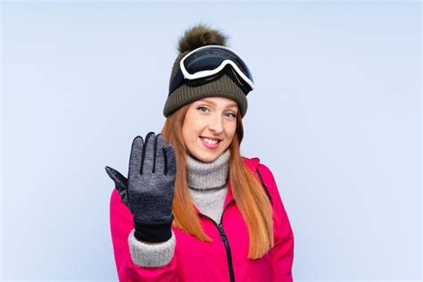 Premium Photo Skier Redhead Woman With Snowboarding Glasses Inviting