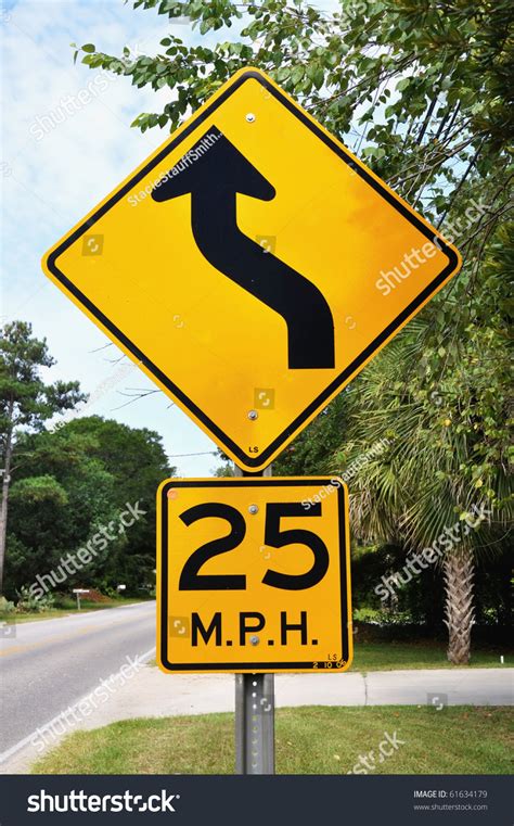 This sign indicates you must proceed straight ahead. Warning Road Sign, Curve Ahead 25 M.P.H. Stock Photo ...