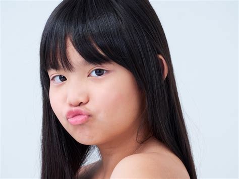 premium photo cute little asian girl with long hair