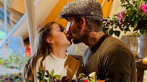 david beckham fans divided over him kissing 9 year old daughter harper on the lips