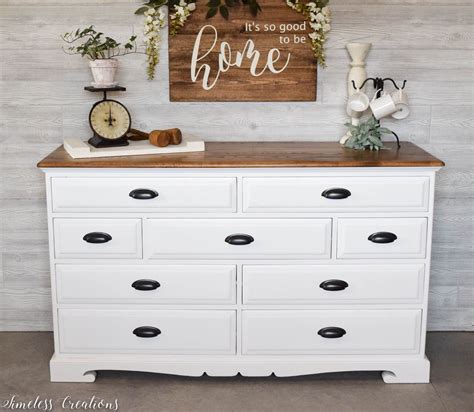 A short dresser in the bedroom makes room for folded clothes while use its surface for storing jewelry, housing a simple table lamp or displaying real or faux plants. The Epitome of Farmhouse Style : White and Wood Dresser in ...
