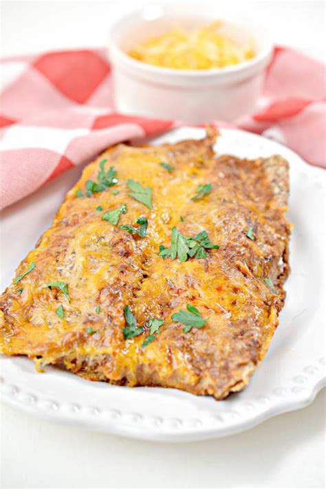 This post may contain affiliate links that help keep this content free. Keto Chicken Enchiladas - EASY Low Carb Chicken Enchiladas ...