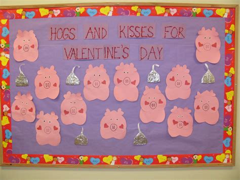 A Bulletin Board With Pigs And Kisses For Valentines Day
