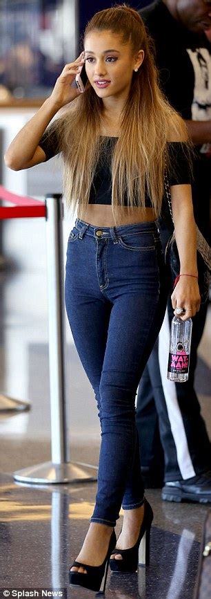Ariana Grandes Fake Tan Fail In Crop Top And Jeans At The Airport