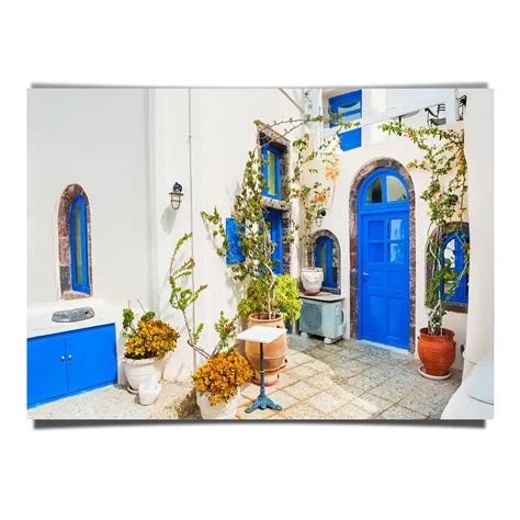 Traditional Greek White Architecture With Blue Doors And Windows In Sa