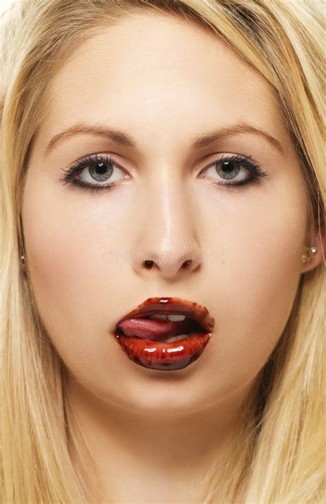 Beautiful Blonde Woman Licking Chocolate From Her Stock Image Image