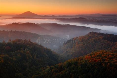 Cold Misty Foggy Morning With Sunrise In A Fall Valley Of Bohemian