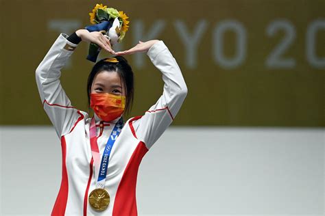 First Gold At Tokyo Olympics Awarded To Chinese Shooter Yang Qian Cgtn