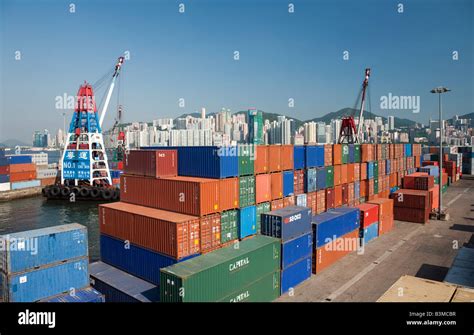 Large Stacks Of Shipping Containers On Dock In Hong Kong Harbour On A