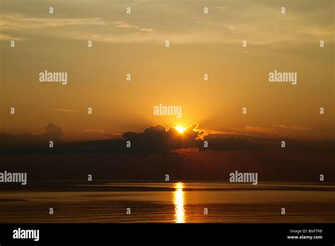 Sunset At Sea Stock Photo Alamy