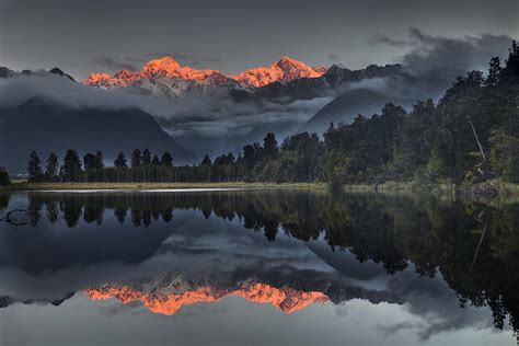 Sunset Reflection Of Lake Matheson Photograph By Colin Monteath