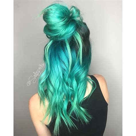 After rinsing it out, lather your hair with purple shampoo. Love this neon pastel green hair color mixed with a bit of ...