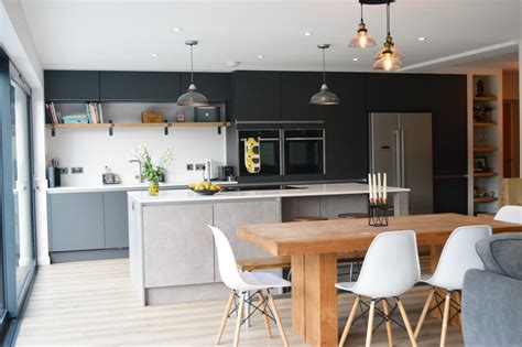 Dark gray kitchen cabinets are trending and we are revealing a gorgeous new kitchen design featuring dark gray. Modern Kitchen Installation in London - Dark Grey Matt and Concrete Effect