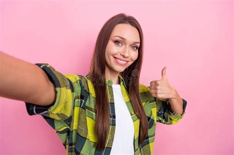 Portrait Of Gorgeous Person Make Selfie Toothy Smile Demonstrate Thumb Up Isolated On Pink Color