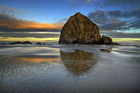 Haystack Rock Reflection in Cannon Beach Oregon Coast at Sunrise. | Cannon beach oregon, Cannon 