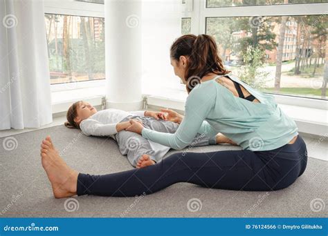 Mother With Daughter Doing Yoga Exercise Stock Photo Image Of Aura Exercise