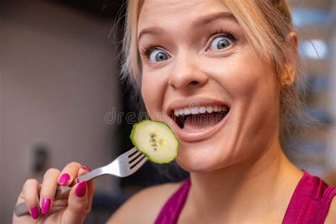 close up on a womanand x27 s face making funny faces with her mouth open stock image image of